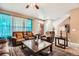 Inviting living room with cozy furniture, warm lighting, and an open layout at 4426 Windmill Dr, Brighton, CO 80601