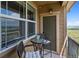Cozy balcony with outdoor seating and a picturesque view provides the perfect spot for relaxation at 10062 W Victoria Pl # 205, Littleton, CO 80127