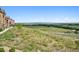 Scenic view from the property showcasing rolling hills and vast green spaces at 10062 W Victoria Pl # 205, Littleton, CO 80127