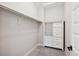 Walk-in closet with adjustable shelving and custom drawers for optimal storage and organization at 10062 W Victoria Pl # 205, Littleton, CO 80127