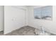 Well-lit bedroom with double door closet and grey carpet at 3989 Gold Bug St, Aurora, CO 80019