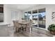 Dining area with sliding doors leading to backyard patio at 3989 Gold Bug St, Aurora, CO 80019