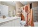 Clean bathroom with shower/tub combo and updated vanity at 24758 E Arizona Cir, Aurora, CO 80018