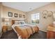 Charming bedroom with mid-century modern decor at 24758 E Arizona Cir, Aurora, CO 80018