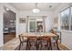 Elegant dining room with wooden table and access to deck at 24758 E Arizona Cir, Aurora, CO 80018