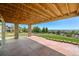Back patio with stone pillars and great views of surrounding neighborhood at 9510 Orion Way, Arvada, CO 80007