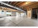 Large unfinished basement with exposed beams and ductwork, ready for customization at 9510 Orion Way, Arvada, CO 80007