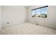 Bedroom featuring carpet and a view of the neighborhood at 9510 Orion Way, Arvada, CO 80007