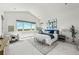 Spacious main bedroom with vaulted ceilings, large windows, and scenic views at 9510 Orion Way, Arvada, CO 80007