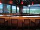 Stylish bar area with granite countertops, comfortable seating, and panoramic views, perfect for entertaining guests at 12636 Sandstone Dr, Broomfield, CO 80021