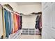 Spacious walk-in closet with ample shelving and hanging space for organized storage at 12636 Sandstone Dr, Broomfield, CO 80021