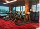 A community gym showing multiple treadmills and natural lighting through large windows at 12636 Sandstone Dr, Broomfield, CO 80021