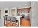 Kitchen with white countertops, stainless steel appliances, and bar stool seating at 12636 Sandstone Dr, Broomfield, CO 80021