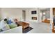 Cozy living room featuring a fireplace, flat screen TV, and comfortable seating at 12636 Sandstone Dr, Broomfield, CO 80021
