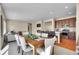 An open living space showing the kitchen, dining, and living area at 12636 Sandstone Dr, Broomfield, CO 80021