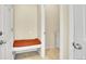 Mud room features a bench seat next to the laundry room with a tile floor at 12636 Sandstone Dr, Broomfield, CO 80021