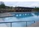 Sparkling community pool with a covered lounge area, perfect for relaxing and enjoying sunny days at 12636 Sandstone Dr, Broomfield, CO 80021