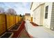 Landscaped backyard with a tidy garden, privacy fence and shed at 17722 E Ida Ave, Centennial, CO 80015
