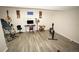 Finished basement area with durable flooring, ideal for a home office or recreation room at 17722 E Ida Ave, Centennial, CO 80015