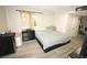 This bedroom features durable flooring and a spacious layout, great for personalization at 17722 E Ida Ave, Centennial, CO 80015