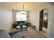 Comfortable living room with a large window for natural light and neutral tones at 17722 E Ida Ave, Centennial, CO 80015