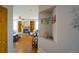 Comfortable living room with fireplace, built-in shelving, and an open layout with hardwood floors at 17722 E Ida Ave, Centennial, CO 80015