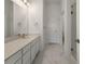 Modern bathroom with double vanity and shower at 9287 Twenty Mile Rd # 401, Parker, CO 80134