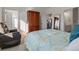 Bedroom with a recliner, large closet, and view at 9287 Twenty Mile Rd # 401, Parker, CO 80134