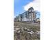 Modern apartment building with a large lawn at 9287 Twenty Mile Rd # 401, Parker, CO 80134