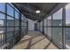 Shared indoor hallway with metal railings and a door at 9287 Twenty Mile Rd # 401, Parker, CO 80134