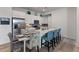 Modern kitchen with stainless steel appliances and an island at 9287 Twenty Mile Rd # 401, Parker, CO 80134
