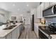 Open concept kitchen featuring stainless steel appliances at 9287 Twenty Mile Rd # 401, Parker, CO 80134