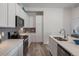 Modern kitchen with stainless steel appliances and white cabinets at 9287 Twenty Mile Rd # 401, Parker, CO 80134
