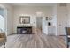Living room with fireplace and access to balcony at 9287 Twenty Mile Rd # 401, Parker, CO 80134