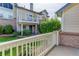 Townhouse with an outdoor patio, manicured front yard, and fresh landscaping at 18324 E Bethany Pl, Aurora, CO 80013