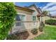 Charming front porch with white railings and landscaped garden beds add curb appeal to this home at 18324 E Bethany Pl, Aurora, CO 80013