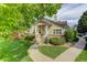 Charming single-Gathering home with a well-manicured lawn and a welcoming entrance at 18324 E Bethany Pl, Aurora, CO 80013