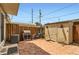 Backyard featuring a patio, outdoor grill, storage shed, and fenced yard at 8613 Santa Fe Dr, Thornton, CO 80260