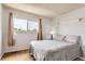 Bedroom featuring a window at 8613 Santa Fe Dr, Thornton, CO 80260