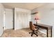 Bedroom featuring a desk, a window, and a chair at 8613 Santa Fe Dr, Thornton, CO 80260