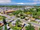 Aerial view highlighting property's location near a local intersection and the city, blending urban accessibility with neighborhood charm at 5920 Garrison St, Arvada, CO 80004