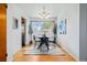 Cozy dining room featuring modern furniture, ample natural light, and a minimalist design at 5920 Garrison St, Arvada, CO 80004