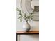 Chic entryway with a decorative mirror and a stylish vase, creating an inviting first impression at 5920 Garrison St, Arvada, CO 80004