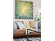 Stylish living room decor featuring unique wall art, comfortable seating, and a chic coffee table at 5920 Garrison St, Arvada, CO 80004