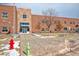 Exterior view of Arapahoe Ridge Elementary with red brick and a light-colored entrance at 1775 W 130Th Pl, Westminster, CO 80234