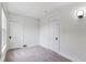 Cozy bedroom featuring plush carpet, natural light, and fresh white trim at 2566 N Emerson St, Denver, CO 80205