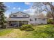 Spacious backyard with a covered patio, perfect for outdoor entertaining and relaxation in a private setting at 12391 E Cedar Cir, Aurora, CO 80012