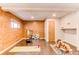 Finished basement offers a space for working out, decorated with a tiger and a vibrant rug at 753 S Utica St, Denver, CO 80219
