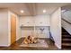 Basement features storage shelves and a charming rug with decorative animal dolls at 753 S Utica St, Denver, CO 80219