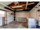 Spacious garage with ample shelving and workspace, perfect for projects and storage at 753 S Utica St, Denver, CO 80219